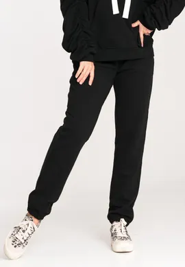 Joggery damskie dresowe - Damskie spodnie dresowe - czarne spodnie dresowe M1056 rozmiar L